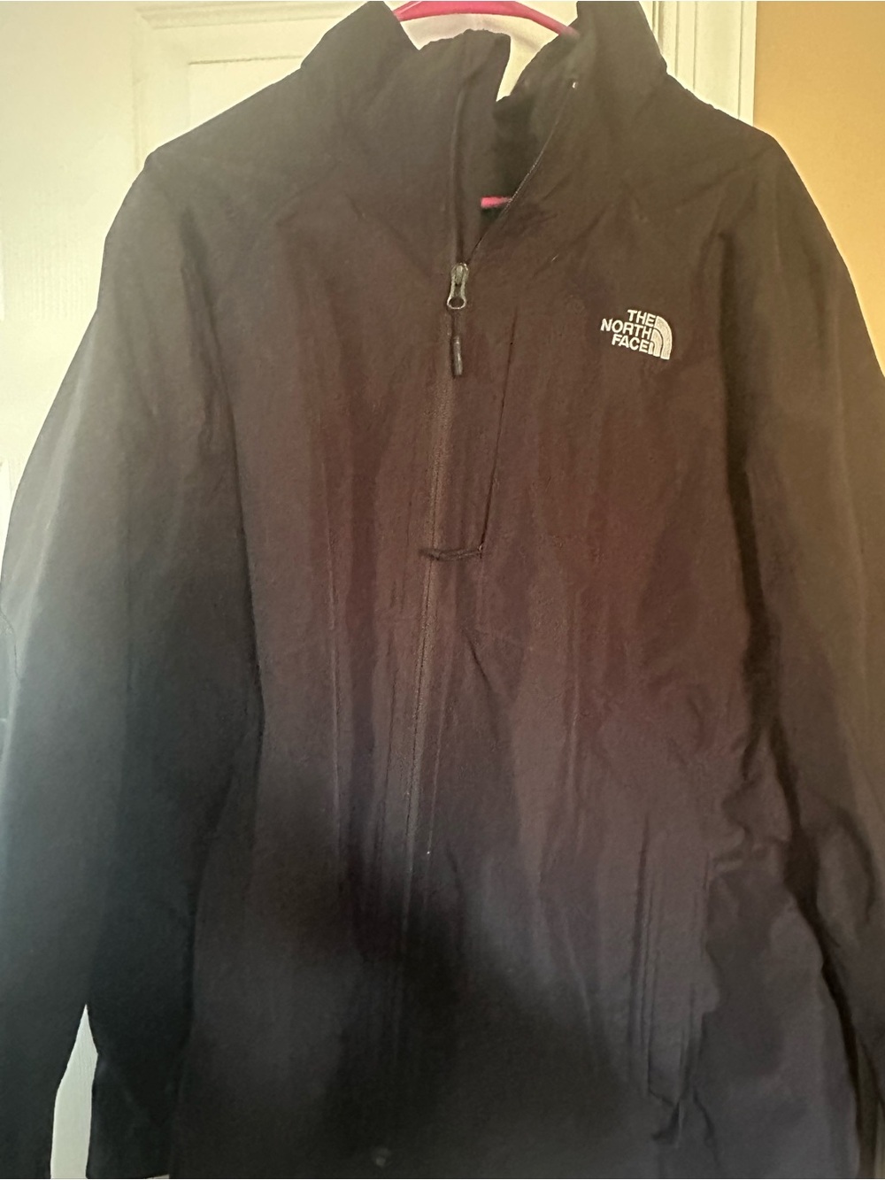 The North Face Black Raincoat with White Logo Accent